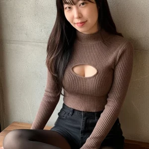 Visualprompt.org a knit top with a chest cut out and black denim shorts. 51493edda0