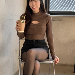 Visualprompt.org a knit top with a chest cut out and black denim shorts. a0d512b0ff