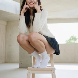 Visualprompt.org black flare skirt, knit top, and white socks snapshot d737f92922