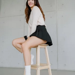 Visualprompt.org black flare skirt, knit top, and white socks snapshot e68db65e97