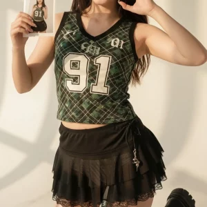 Visualprompt.org green checkered sleeveless top and a black ruffled mini skirt a4b0dfbf64