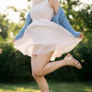 Visualprompt.org snapshot of a model in a chiffon one piece dress at a park 04dcab06f9