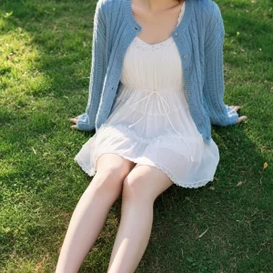Visualprompt.org snapshot of a model in a chiffon one piece dress at a park 1494d638e4