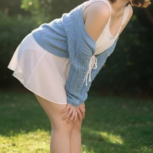 Visualprompt.org snapshot of a model in a chiffon one piece dress at a park 1e8c545728