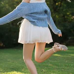 Visualprompt.org snapshot of a model in a chiffon one piece dress at a park 3aa6fc5b28