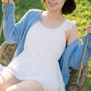 Visualprompt.org snapshot of a model in a chiffon one piece dress at a park 72c90eff0a