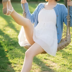 Visualprompt.org snapshot of a model in a chiffon one piece dress at a park 889911905f